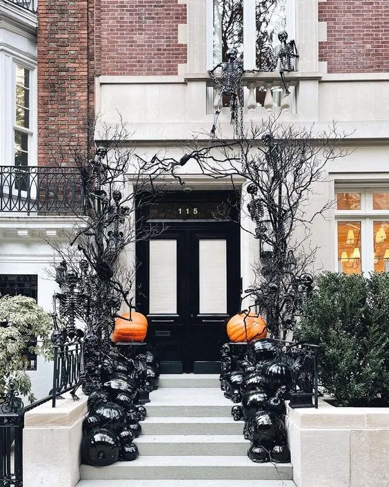 Black branches and pumpkins